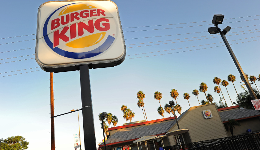 A Burger King sign outside a restaurant in Glendale, California, on September 2, 2010. Burger King, the second-largest US hamburger chain, will be sold to 3G Capital investment house for four billion dollars, the fast food chain announced Thursday. 3G Capital agreed to acquire all Burger King stock for 24 dollars per share in cash, representing a 46 percent premium, and will also assume the company's outstanding debt, Burger King said in a statement.    AFP PHOTO / Robyn Beck (Photo credit should read ROBYN BECK/AFP/Getty Images)