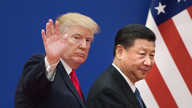 A trade war between the United States and China could potentially provide benefits to a handful of industries in Canada but the overall impact would have a negative effect on the Canadian economy, some experts warn. (Nicolas Asfouri/AFP/Getty Images)