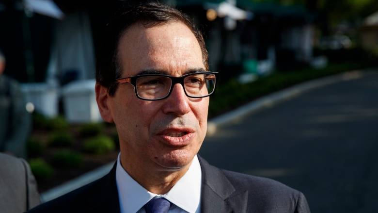 U.S. Treasury Secretary Steve Mnuchin, seen here speaking with reporters outside of the White House on Monday, says the Trump administration remained focused on crafting a new NAFTA deal that would require congressional approval, but that President Donald Trump could consider a possible so-called "skinny deal" that would not. (Evan Vucci/Associated Press)