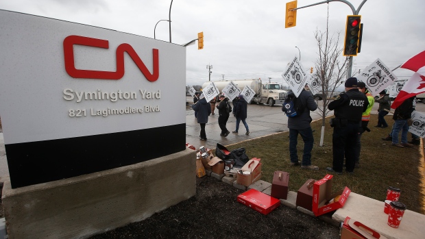 CN workers walk the picket line at Winnipeg's Symington Yards - THE CANADIAN PRESS/John Woods