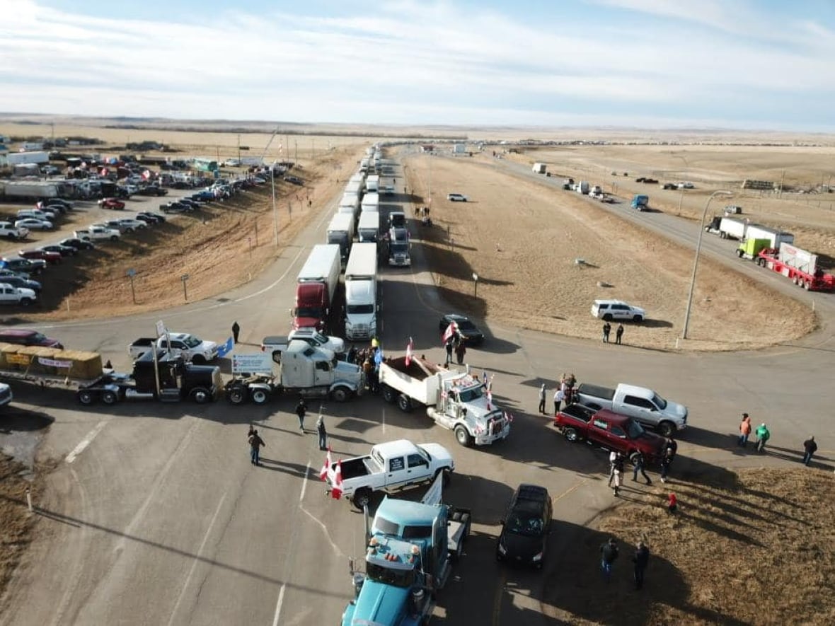 A blockade of trucks has prevented cross-border traffic into the United States at Coutts, Alta., since Saturday. (Submitted by Jake Zacharias)