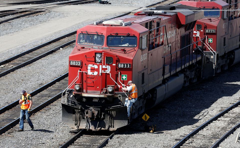 A Canadian Pacific Railway crew works on their train at the CP Rail yards in Calgary, Alberta. REUTERS/Todd Korol//File Photo