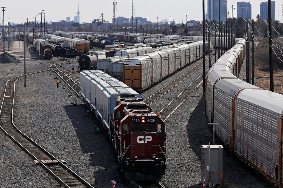 A Canadian Pacific Railway (CP Rail) locomotive backs into position at the company's Toronto Yard in Scarborough, Ontario, Canada March 20, 2022. REUTERS/Chris Helgren/File Photo