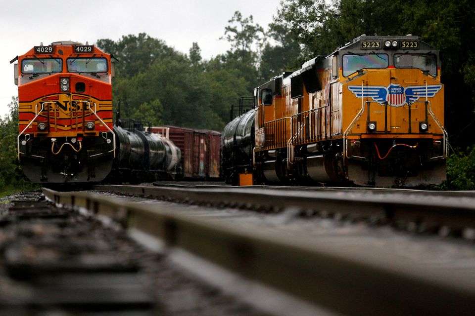 BNSF and Union Pacific train engines stand on tracks n Orange, Texas, U.S., on August 30, 2017. REUTERS/Jonathan Bachman