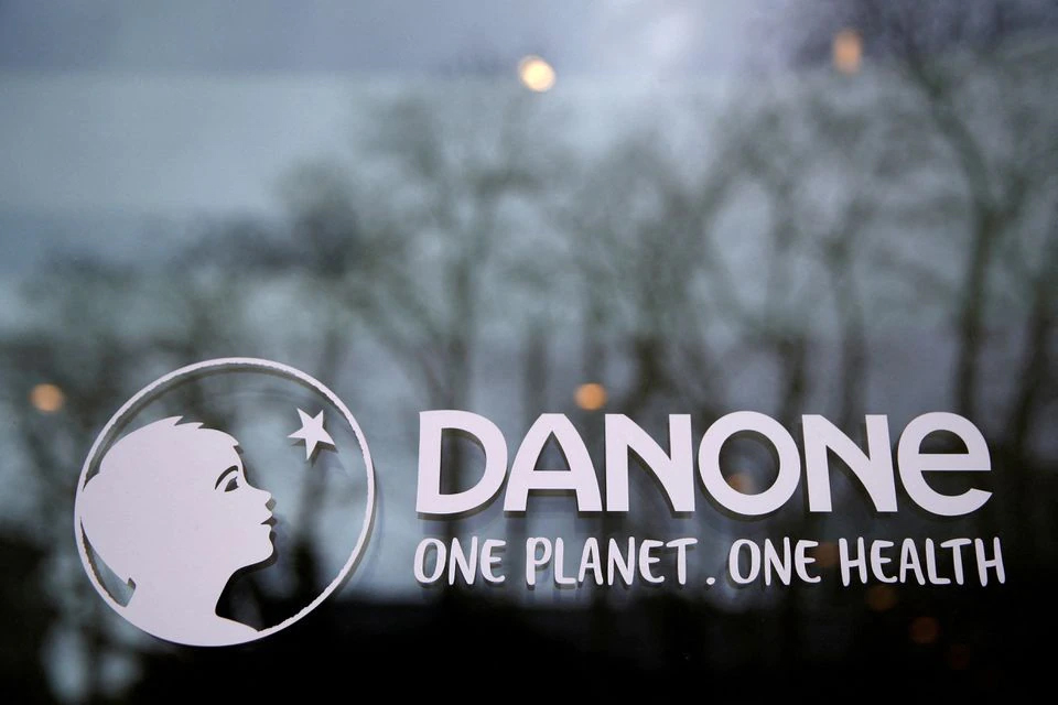 French food group Danone logo is seen at the company headquarters in Rueil-Malmaison near Paris, France, February 18, 2021. REUTERS/Gonzalo Fuentes