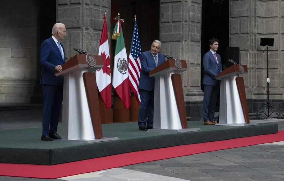 United States President Joe Biden and Prime Minister Justin Trudeau listen to Mexican President Andres Manuel Lopez Obrador speak during a joint news conference as they take their seats for a meeting at the at the North American Leaders Summit Tuesday, January 10, 2023 in Mexico City, Mexico. THE CANADIAN PRESS/Adrian Wyld
ajw