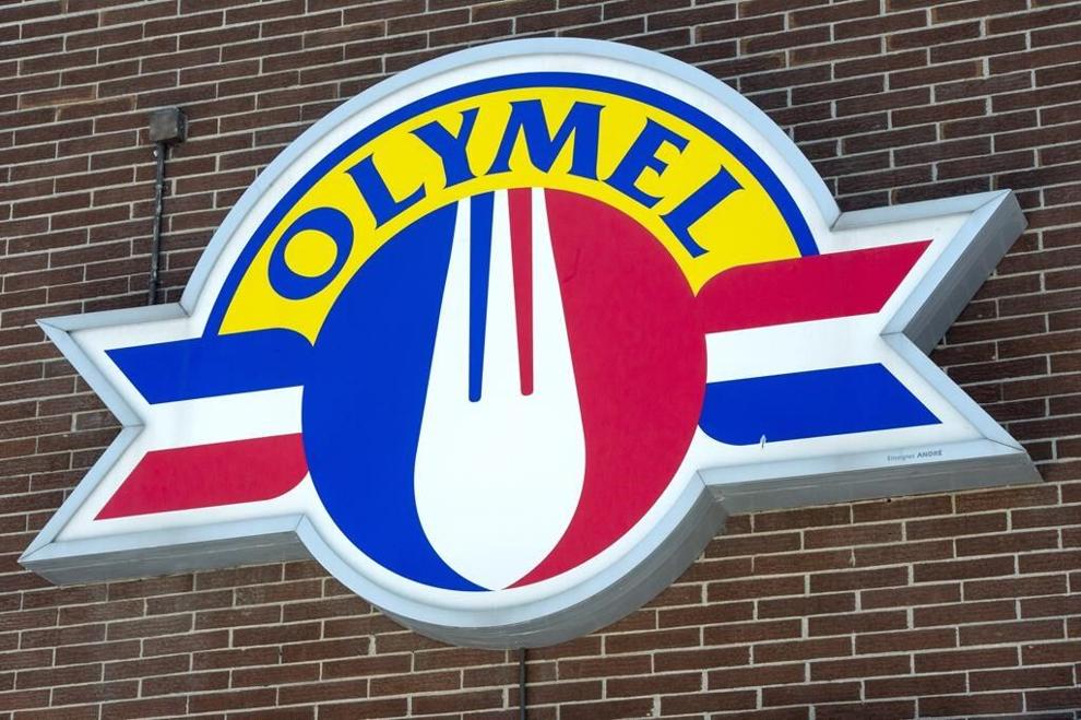 An Olymel sign is shown in Montreal on Tuesday, March 24, 2020, in Montreal. Olymel is closing two plants in Quebec and Ontario and accelerating the closure of another, affecting around 400 employees as the company says it's still facing market challenges.THE CANADIAN PRESS/Ryan Remiorz