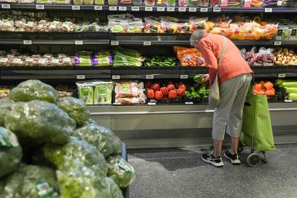 A customer shops in a new "small format" No Frills grocery store, in Toronto, Thursday, May 30, 2024. THE CANADIAN PRESS/Chris Young