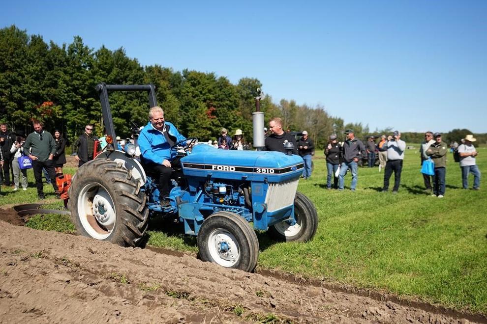 Ontario politicians are set to make their annual pilgrimage to the International Plowing Match today. Ontario Premier Doug Ford plows a field with a tractor at the 2023 International Plowing Match and Rural Expo, in Bowling Green, Ont., Tuesday, Sept. 19, 2023. THE CANADIAN PRESS/Nathan Denette